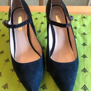 Dress heels, navy blue suede and snake skin leather and leather sole.